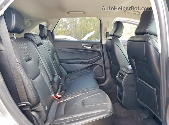 2FMPK4K99PBA47463 2023 FORD EDGE Серебряный Вид задней части салона