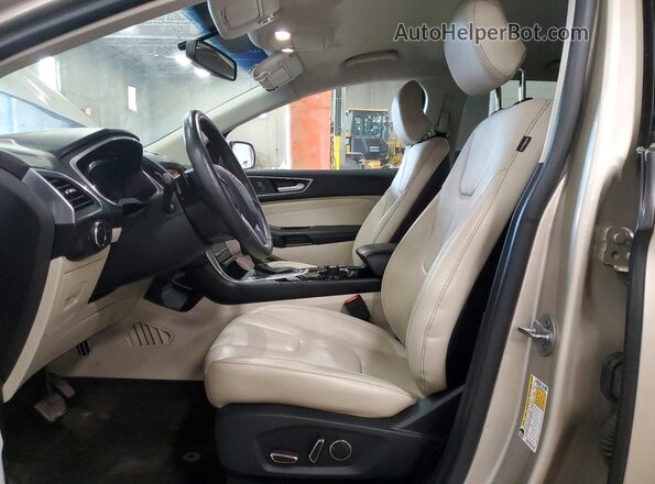 2FMPK4K9XHBC08727 2017 FORD EDGE Gold Front interior view