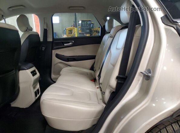 2FMPK4K9XHBC08727 2017 FORD EDGE Gold Rear interior view