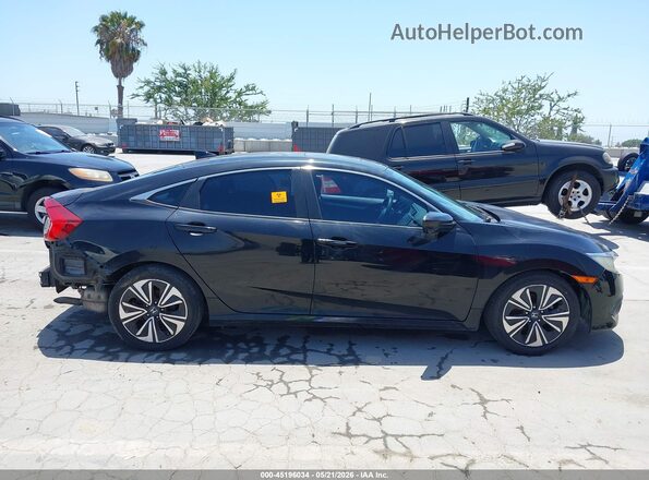 2HGFC1F37GH632560 2016 HONDA CIVIC Черный Вид задней части салона