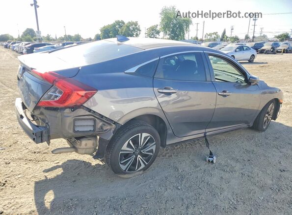 2HGFC1F37GH646538 2016 HONDA CIVIC Gray Trasero derecho