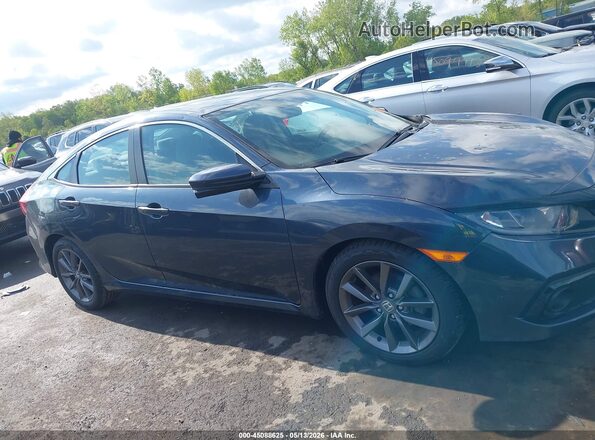 2HGFC1F3XMH703049 2021 HONDA CIVIC Gray Rear interior view