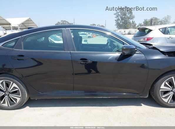 2HGFC1F70HH638270 2017 HONDA CIVIC Черный Вид задней части салона