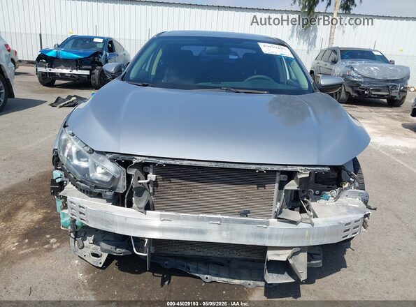2HGFC2F54HH545952 2017 HONDA CIVIC Серый Вид задней части салона