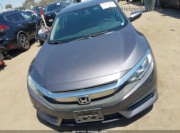 2HGFC2F57GH565918 2016 HONDA CIVIC Серый Вид задней части салона