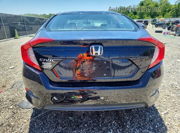 2HGFC2F59JH558704 2018 HONDA CIVIC Black Rear view