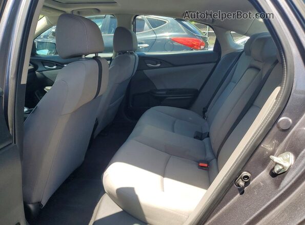 2HGFC2F75JH537351 2018 HONDA CIVIC Silver Rear seats view