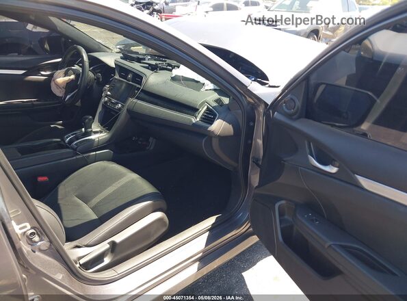 2HGFC2F89KH606682 2019 HONDA CIVIC Серый Вид салона спереди