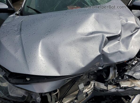 2HGFC4B09JH302228 2018 HONDA CIVIC Silver უკანა სალონის ხედი