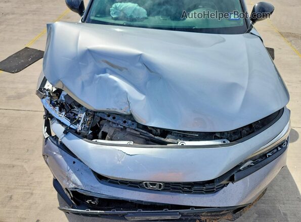 2HGFE2F54SH506229 2025 HONDA CIVIC Silver Vista interior trasera