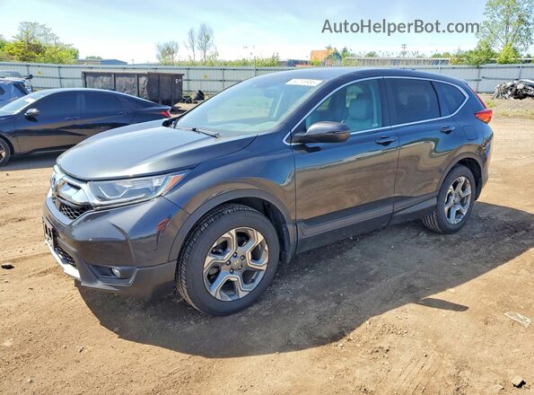 2HKRW2H83KH603770 2019 HONDA CR-V Charcoal Vista tres cuartos delantera izquierda