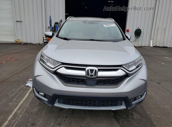 2HKRW2H91HH654699 2017 HONDA CR-V Серебряный Вид спереди