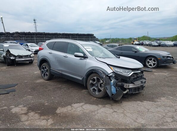 2HKRW2H95HH615646 2017 HONDA CR-V Серебряный Передняя правая четверть