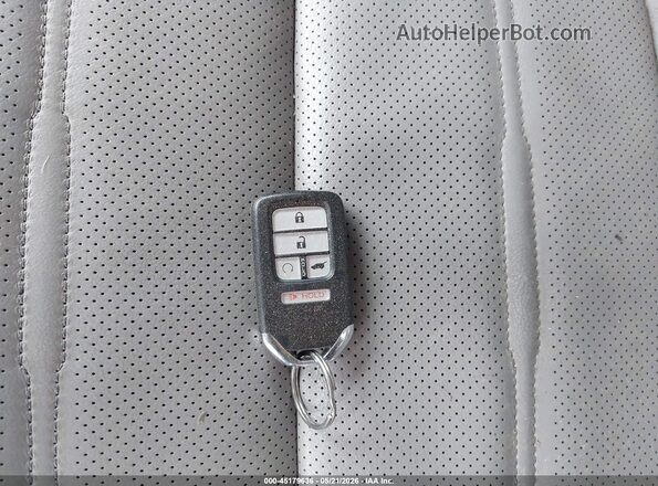 2HKRW2H95HH615646 2017 HONDA CR-V Серебряный Вид панели приборов