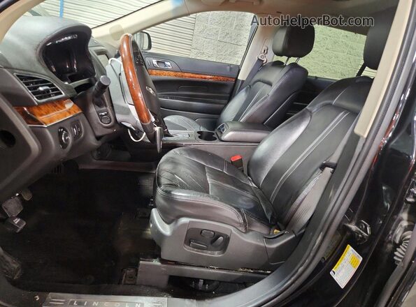 2LMHJ5AT0KBL01648 2019 LINCOLN MKT Черный Вид салона спереди