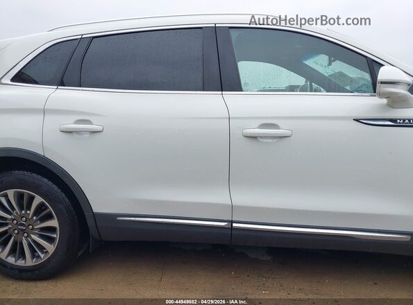 2LMPJ6J98LBL26966 2020 LINCOLN NAUTILUS Белый Вид задней части салона