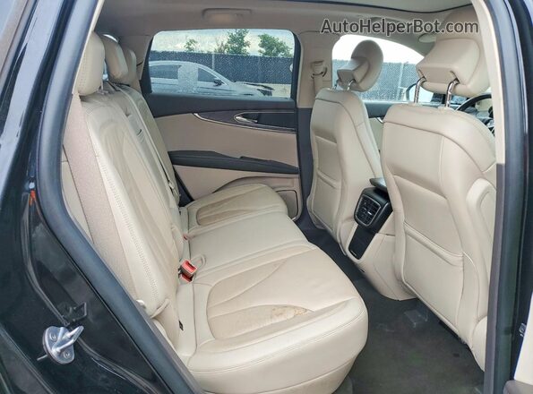 2LMPJ6K95KBL35282 2019 LINCOLN NAUTILUS Черный Вид задней части салона