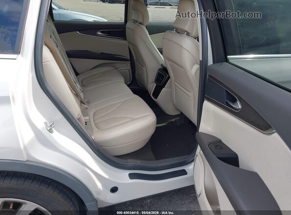 2LMPJ6K98KBL57017 2019 LINCOLN NAUTILUS Желто-коричневый Вид наклейки с VIN-кодом