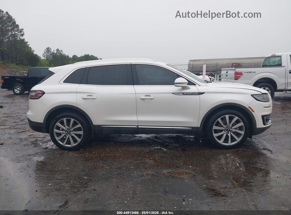 2LMPJ6K9XKBL66544 2019 LINCOLN NAUTILUS White Vista interior trasera