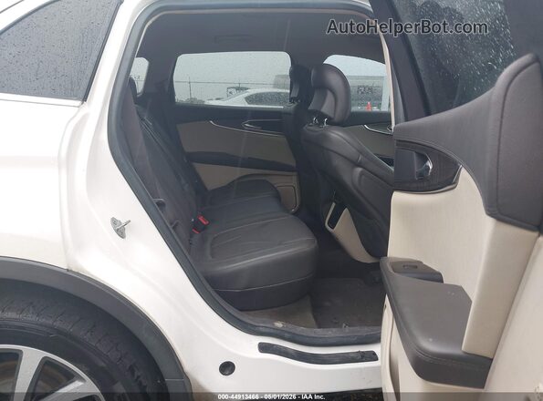 2LMPJ6K9XKBL66544 2019 LINCOLN NAUTILUS White Vista de la etiqueta del VIN