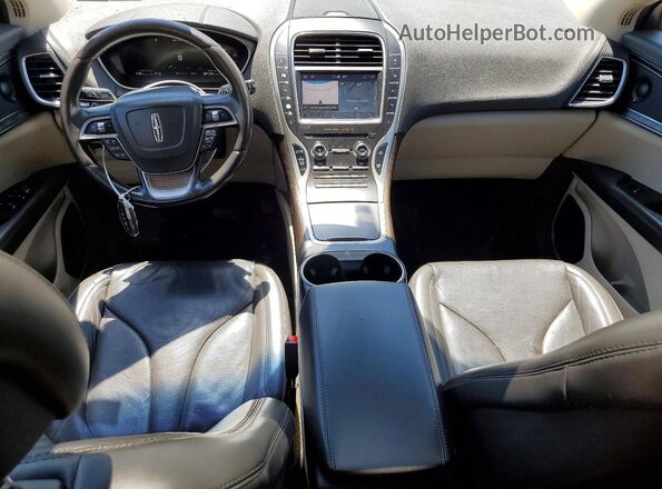 2LMPJ6L91KBL42485 2019 LINCOLN NAUTILUS Коричневый Вид панели приборов
