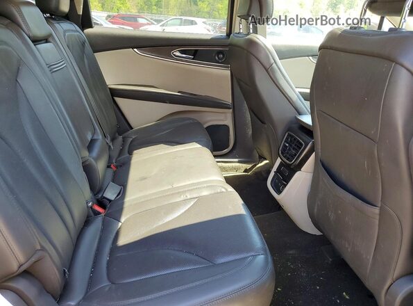 2LMPJ6L91KBL42485 2019 LINCOLN NAUTILUS Коричневый Вид задней части салона