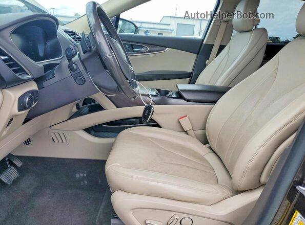 2LMPJ6L93KBL62995 2019 LINCOLN NAUTILUS Коричневый Вид салона спереди