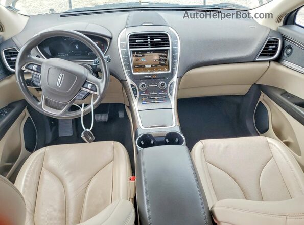 2LMPJ6L93KBL62995 2019 LINCOLN NAUTILUS Коричневый Вид панели приборов