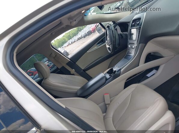 2LMPJ6LR0HBL18770 2017 LINCOLN MKX Бежевый Вид салона спереди