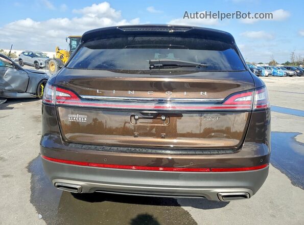 2LMPJ7J93KBL45672 2019 LINCOLN NAUTILUS Коричневый Вид сзади