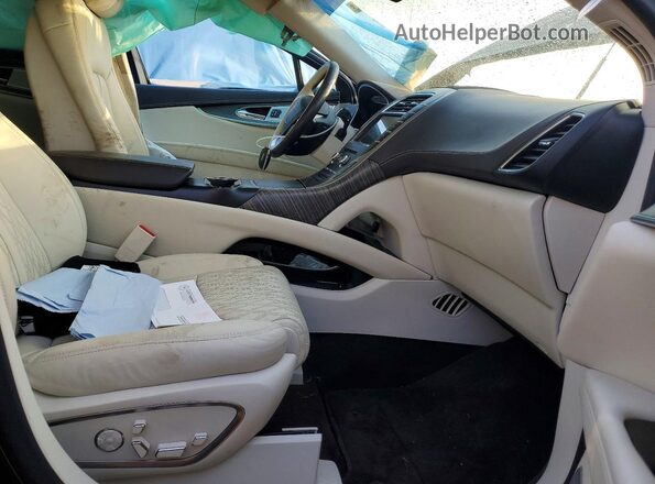 2LMPJ7J93KBL45672 2019 LINCOLN NAUTILUS Коричневый Вид салона спереди