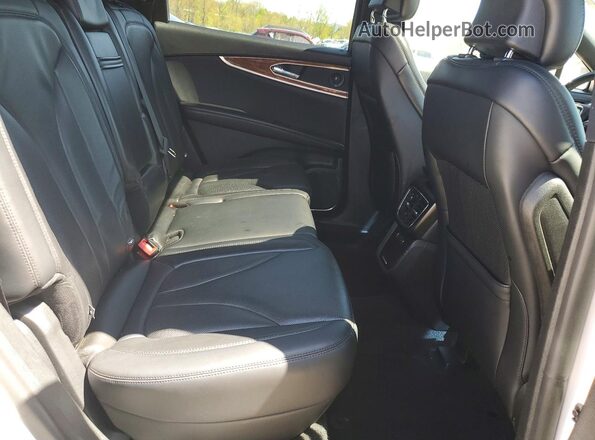 2LMPJ8L99KBL30242 2019 LINCOLN NAUTILUS Белый Вид задней части салона