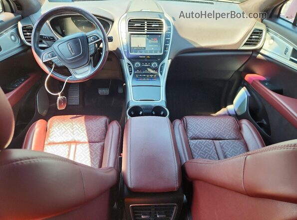 2LMPJ9JP8KBL33561 2019 LINCOLN NAUTILUS Бордовый Вид панели приборов