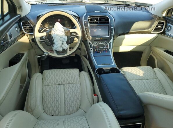 2LMPJ9JP8LBL04661 2020 LINCOLN NAUTILUS Серебряный Вид панели приборов
