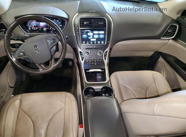2LMTJ8LR8GBL67286 2016 LINCOLN MKX Tan Widok deski rozdzielczej
