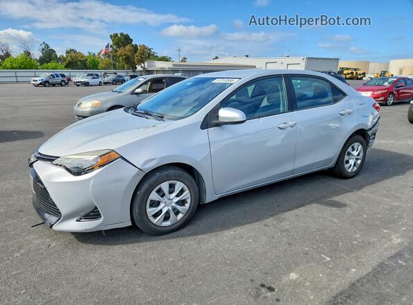 2T1BURHE0HC774980 2017 TOYOTA COROLLA Серебряный Передняя левая четверть