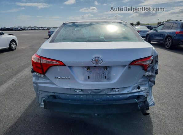 2T1BURHE0HC774980 2017 TOYOTA COROLLA Серебряный Вид сзади