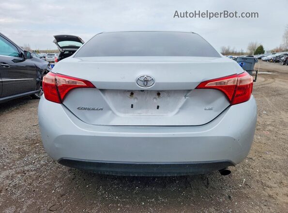 2T1BURHE0KC230762 2019 TOYOTA COROLLA Silver Вид ззаду