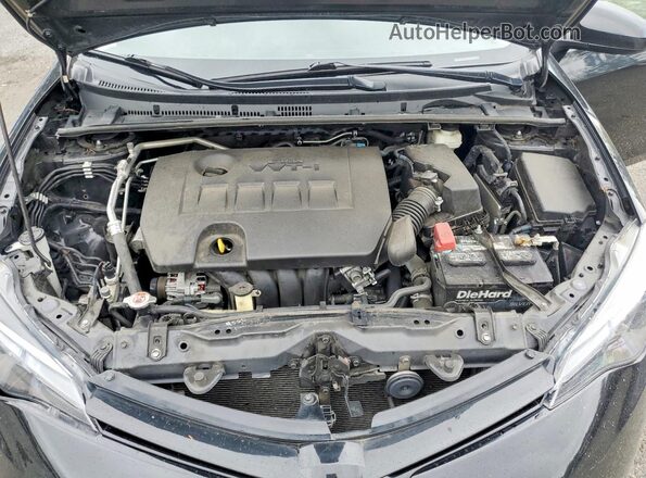 2T1BURHE1HC871475 2017 TOYOTA COROLLA Black Vista interior trasera