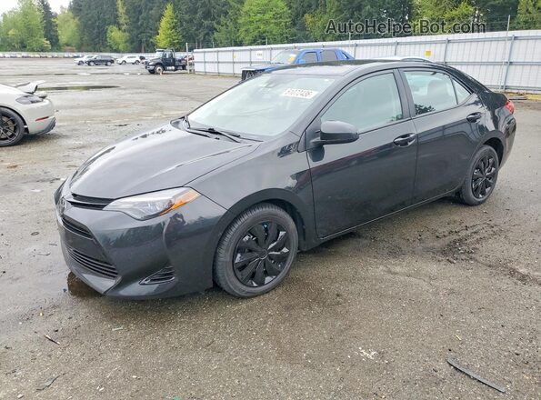 2T1BURHE1HC871475 2017 TOYOTA COROLLA Black Vista tres cuartos delantera izquierda