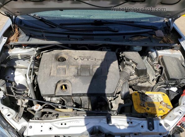 2T1BURHE1JC119572 2018 TOYOTA COROLLA Серебряный Вид задней части салона