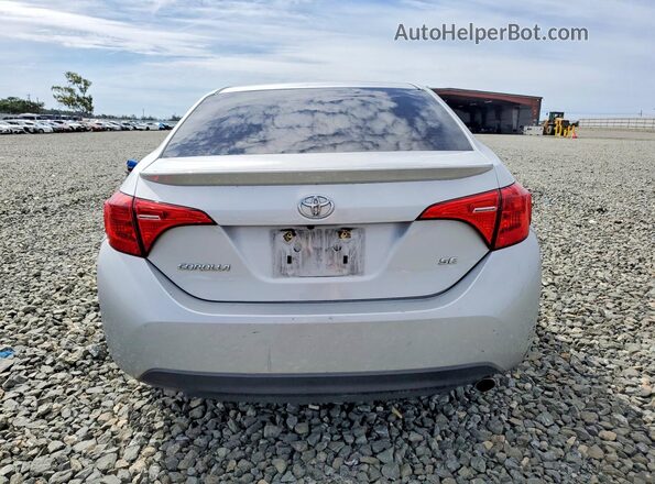 2T1BURHE1KC202033 2019 TOYOTA COROLLA Silver Вид ззаду