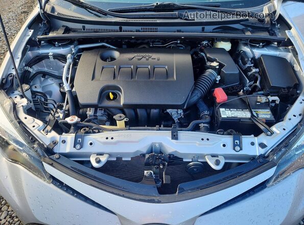 2T1BURHE2HC828618 2017 TOYOTA COROLLA Серебряный Вид задней части салона