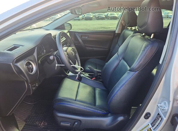 2T1BURHE2HC828618 2017 TOYOTA COROLLA Серебряный Вид салона спереди