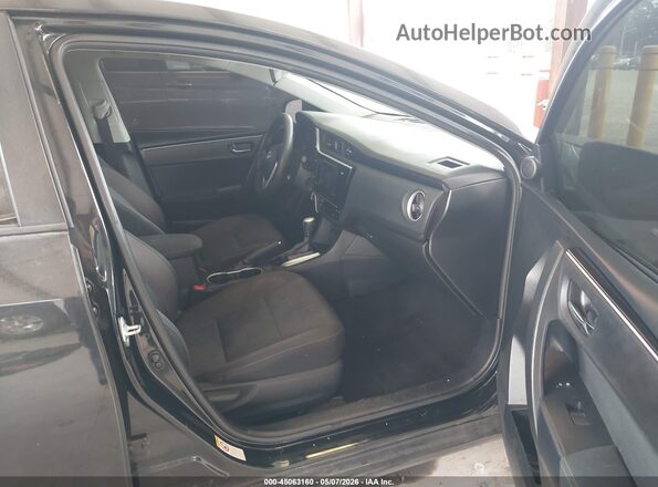 2T1BURHE2HC929917 2017 TOYOTA LL Black Widok wnętrza z przodu