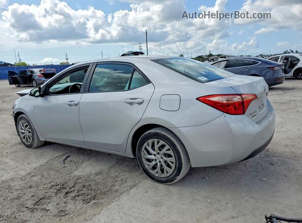 2T1BURHE2KC139878 2019 TOYOTA LL Серебряный Задняя левая четверть