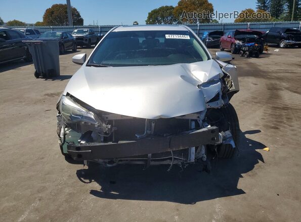 2T1BURHE2KC202378 2019 TOYOTA COROLLA Серебряный Вид спереди