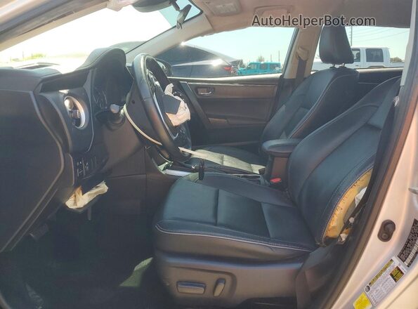 2T1BURHE2KC202378 2019 TOYOTA COROLLA Серебряный Вид салона спереди