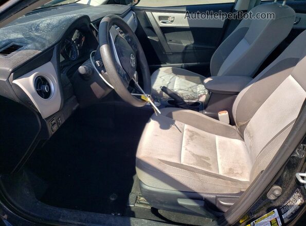2T1BURHE3KC169634 2019 TOYOTA COROLLA Черный Вид салона спереди