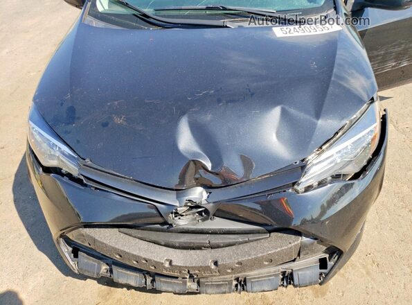 2T1BURHE3KC169634 2019 TOYOTA COROLLA Черный Вид задней части салона